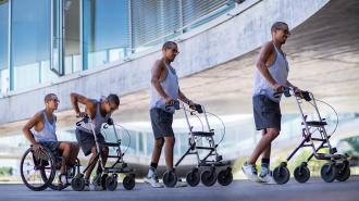 a composition of a man getting out of a wheelchair to use a walker