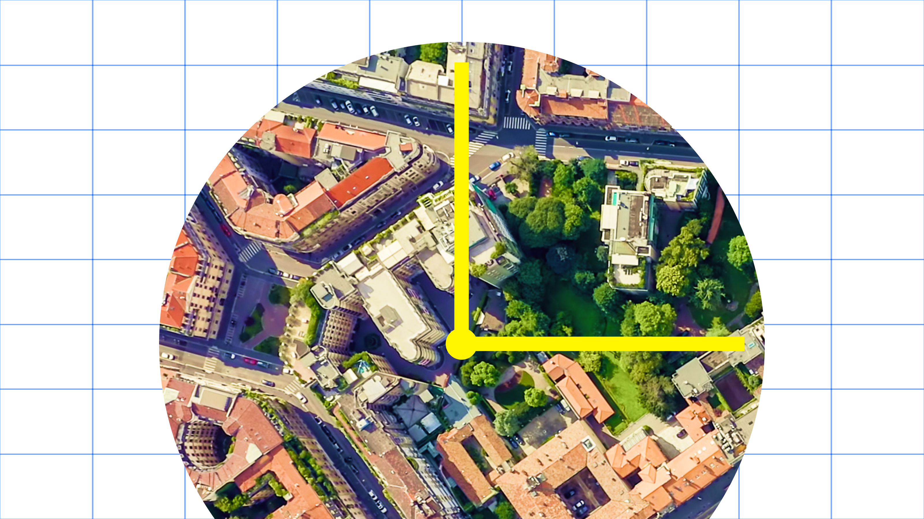 An aerial view of a city with a yellow arrow.