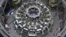 An aerial view of the JT-60SA, a large nuclear fusion machine inside a building.