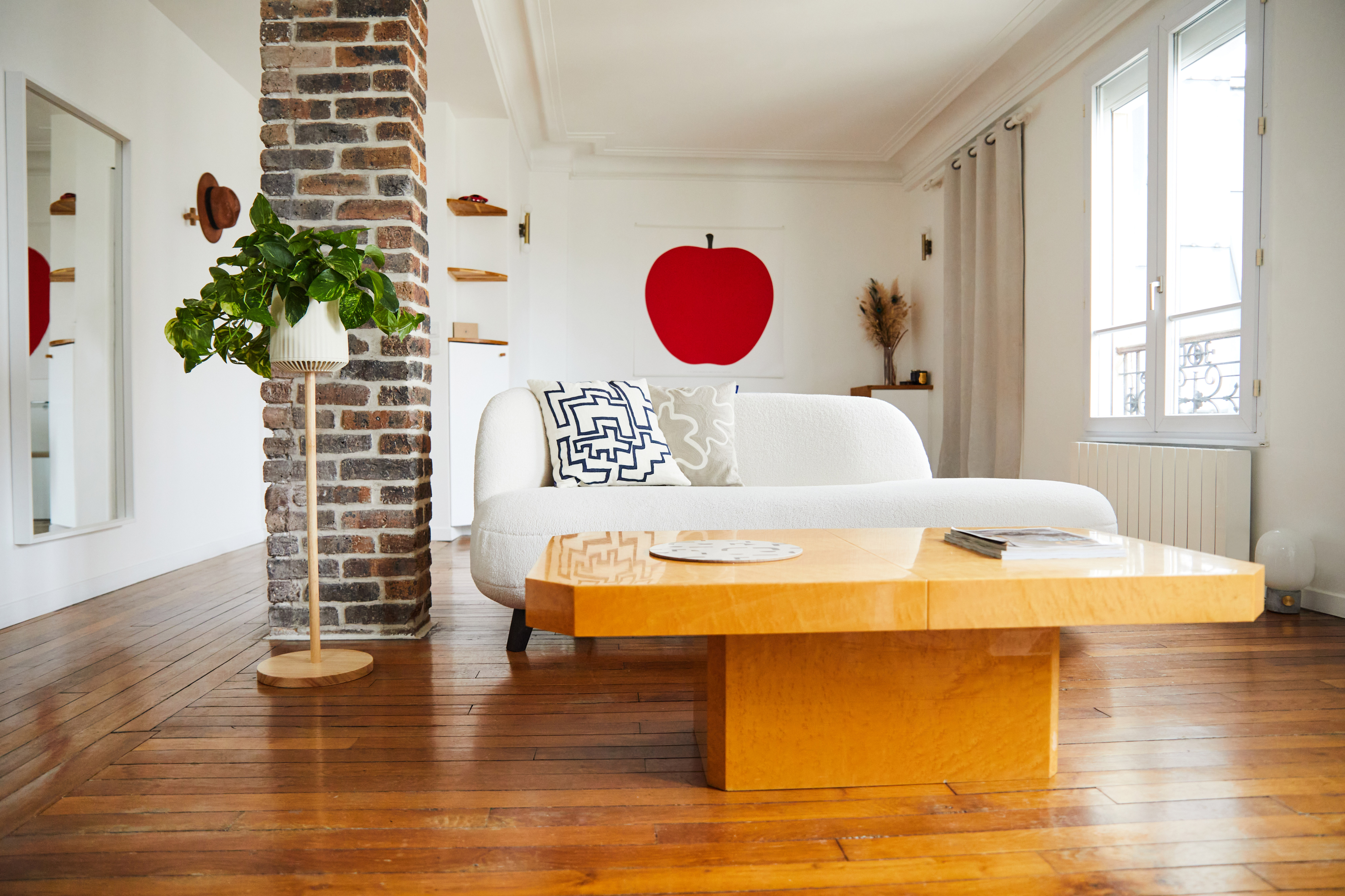 A white couch in a living room.