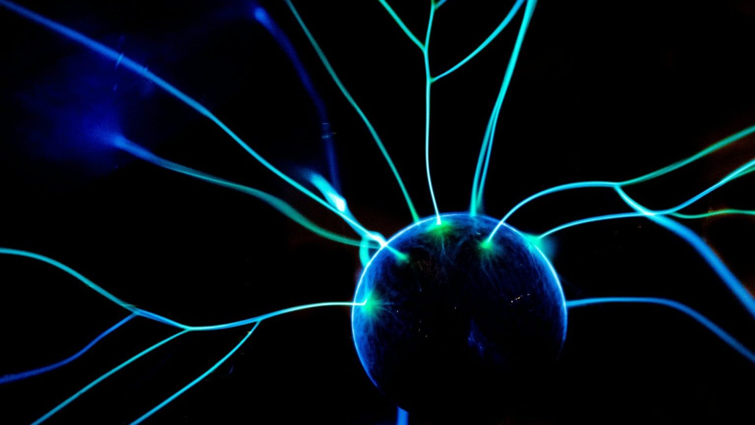 A close up of a brain with blue lights on it.