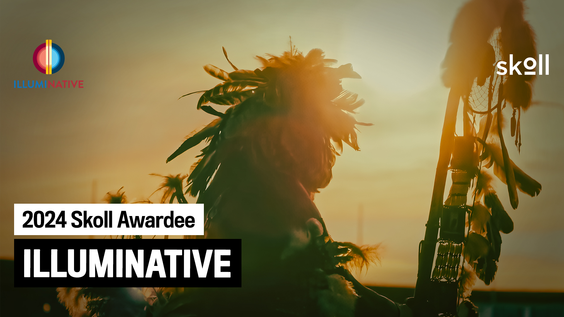 A silhouette of a person wearing a feathered headdress against a sunset background. Text on the image reads "2024 Skoll Awardee, IllumiNative" with the Skoll and IllumiNative logos.