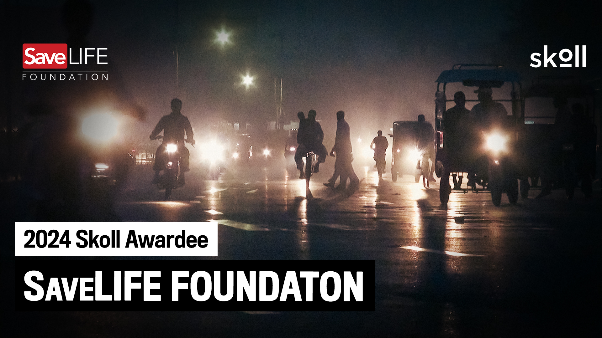 Nighttime street scene with silhouettes of people on motorcycles and autos. Text on image: "2024 Skoll Awardee SaveLIFE Foundation." SaveLIFE and Skoll logos are present.